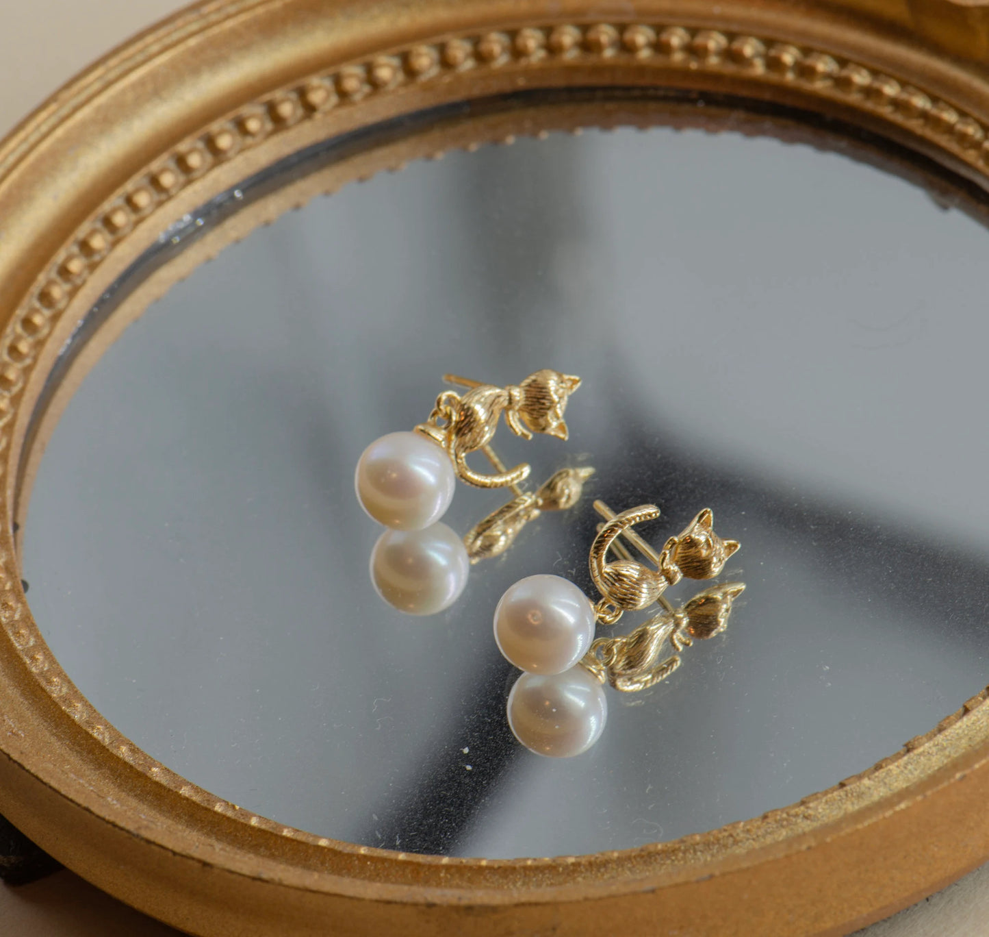 Pearl Cat Stud Earrings - Crafted with freshwater pearl, genuine