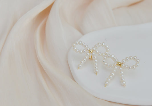 Handmade natural freshwater pearl stub earrings/stunning pearl bow earrings