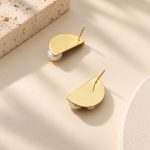 Back view of half-moon pearl crystal earrings showing the stud posts