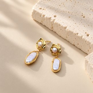 Baroque pearl earrings with small round pearls in molten-style golden settings