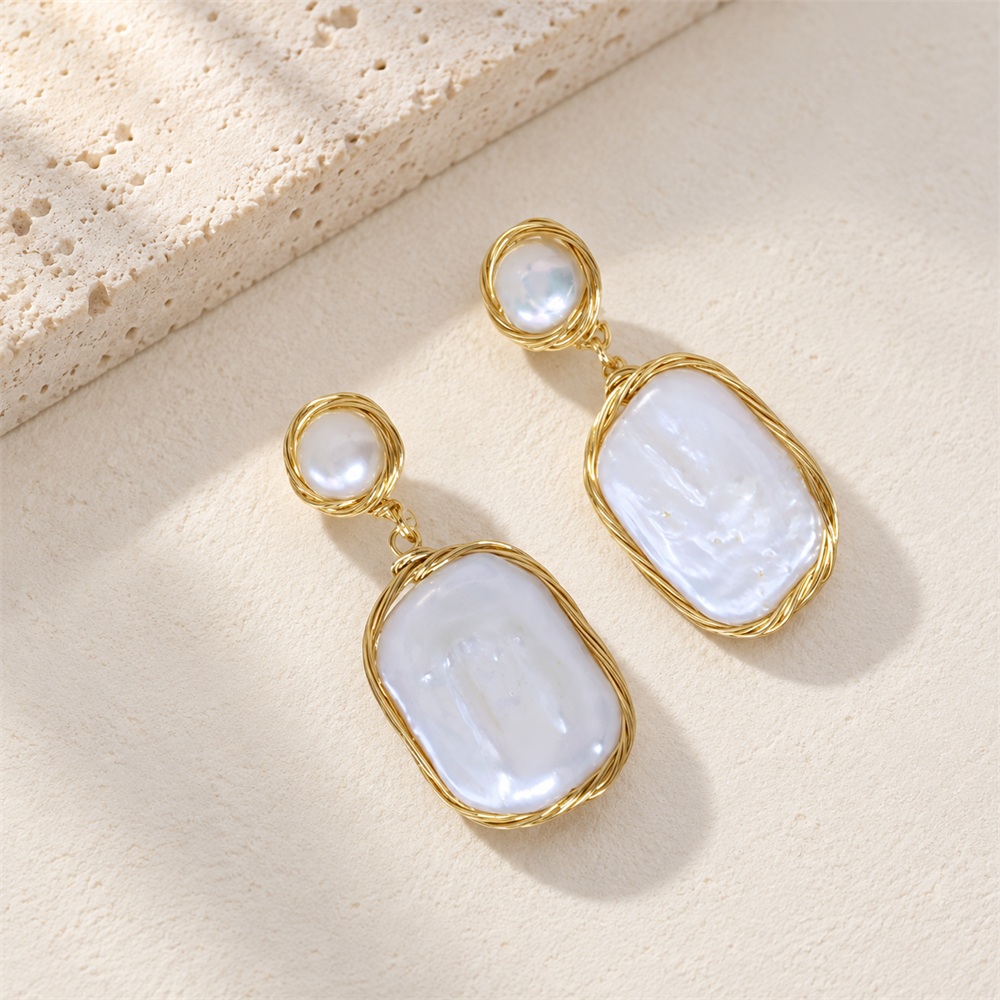 Front view of rectangular freshwater pearl drop earrings with round pearl tops and golden wire frames