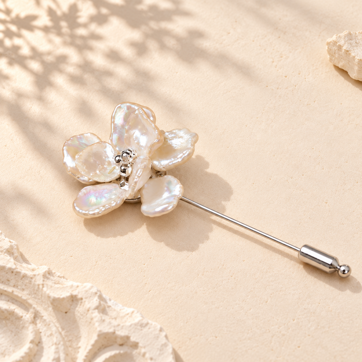Silver-toned pearl flower stick-pin brooch with a beaded center and matching end cap