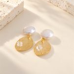 Back view of brushed disc pearl earrings showing stud posts and pearl drops