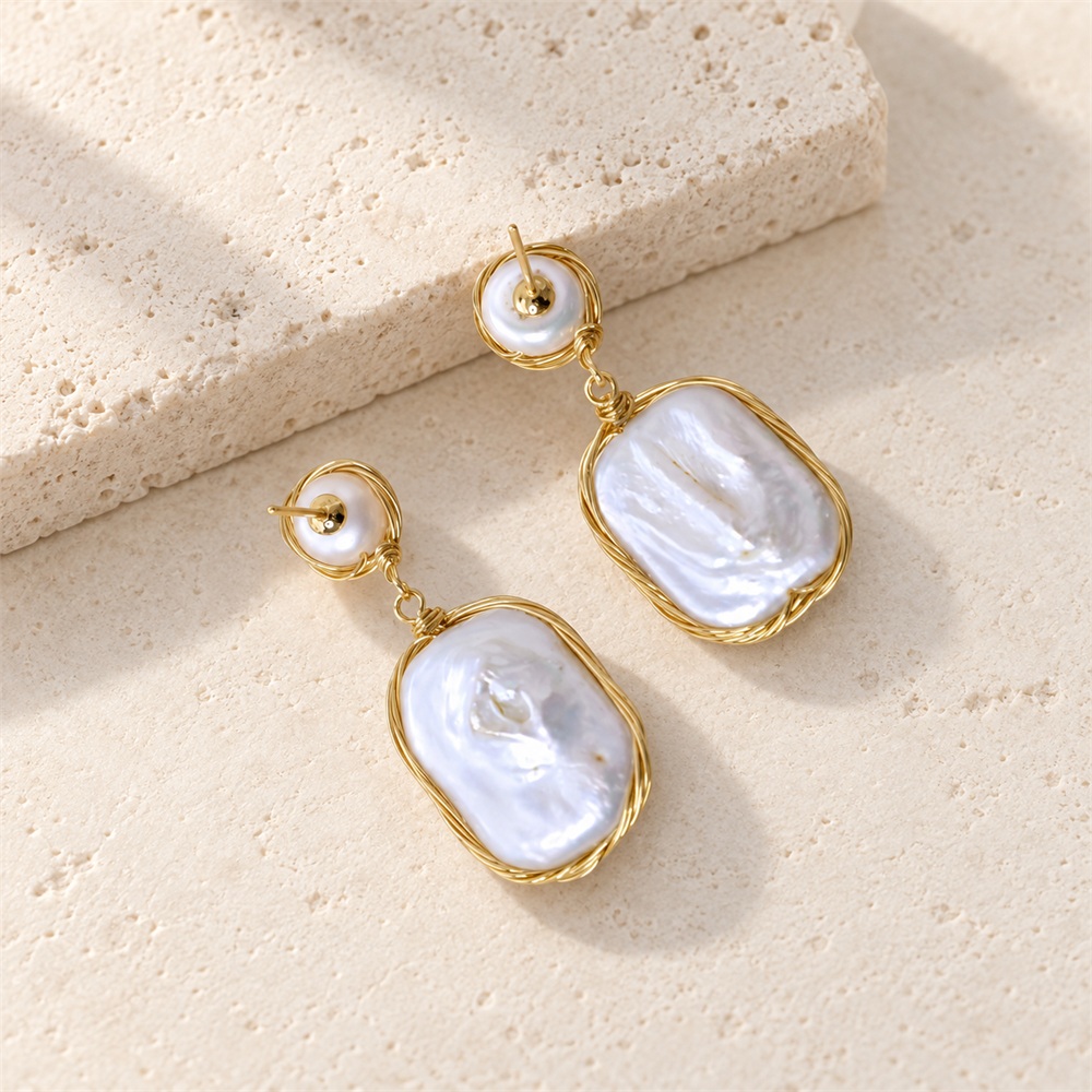 Reverse of rectangular pearl drop earrings, showing stud posts and wire framing
