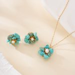Turquoise flower necklace and matching earrings with pearl centers