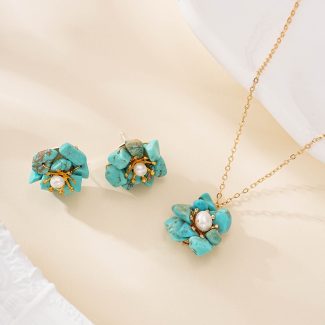 Turquoise flower necklace and matching earrings with pearl centers