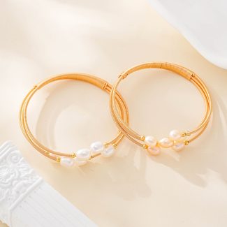 Open wire cuff bracelet with freshwater pearl clusters