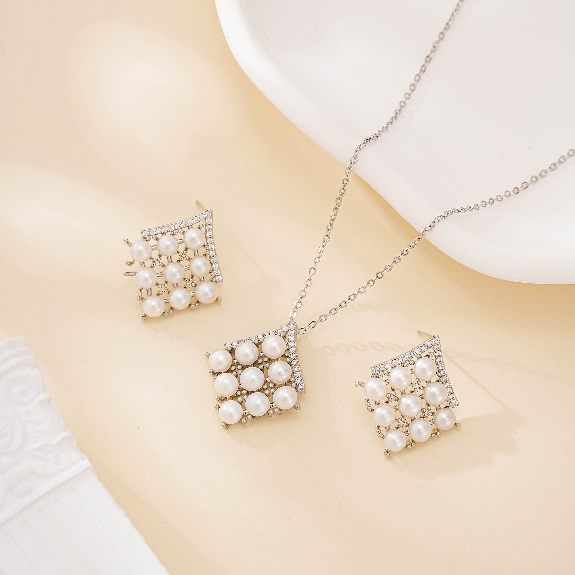 Pavé grid pearl pendant necklace with matching stud earrings