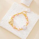 Mixed Baroque Pearl Bracelet with Sculptural Gold-Tone Accent