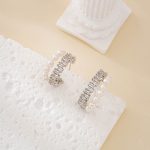 Silver-tone zircon half-hoop stud earrings with freshwater pearls
