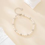 Silver-tone zircon ball and freshwater pearl bracelet