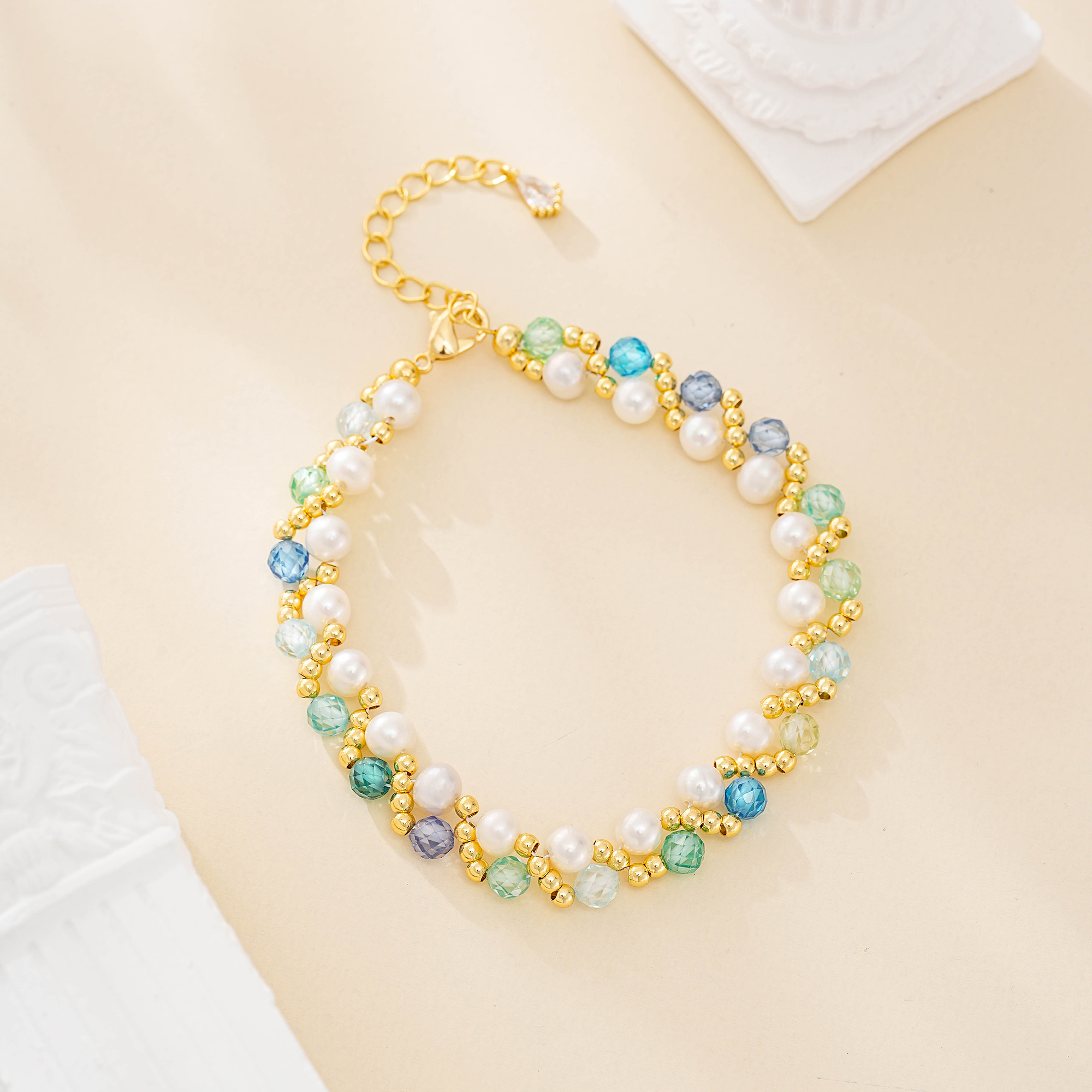 Green crystal and pearl woven bracelet