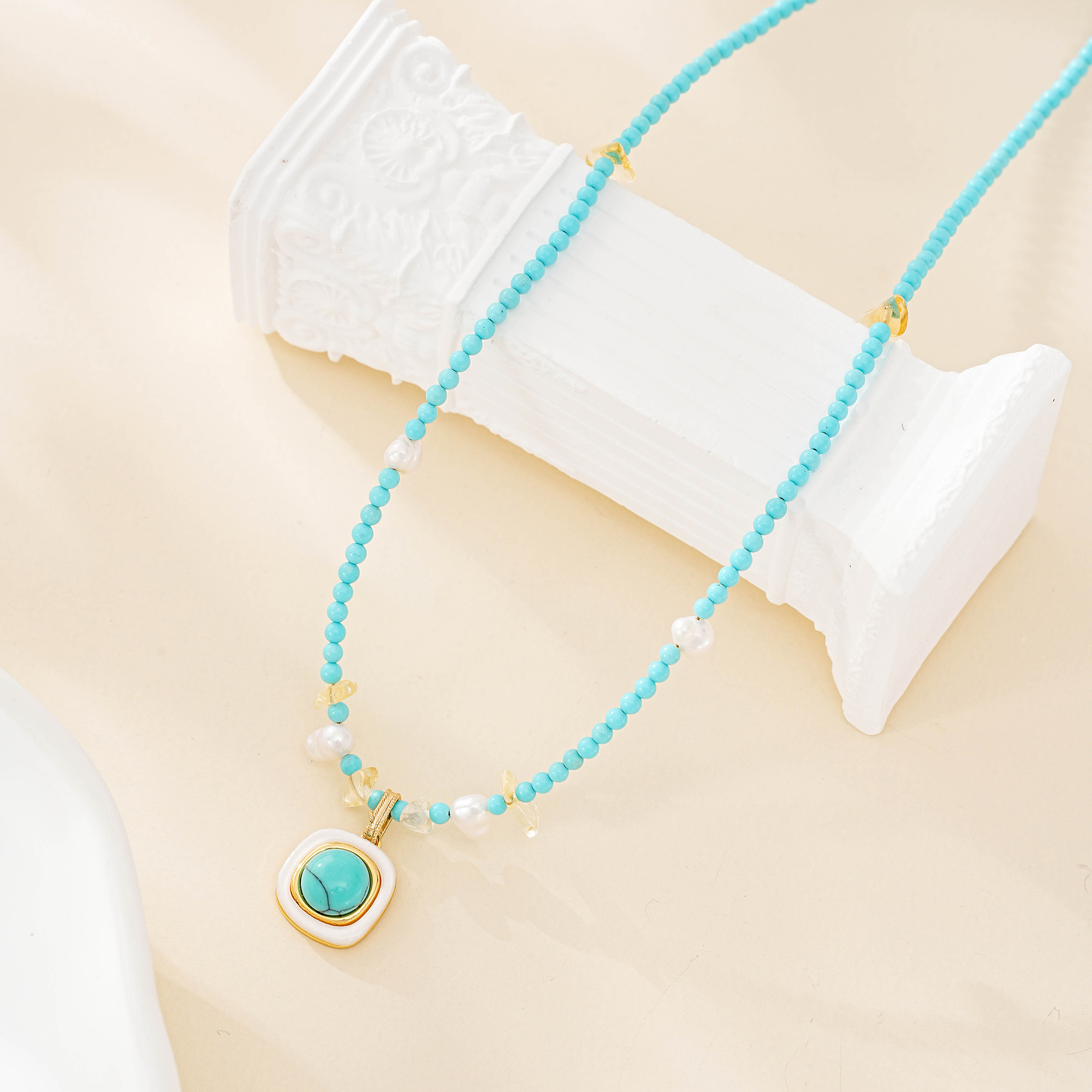 Turquoise beaded pendant necklace with freshwater pearl accents