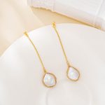 Long baroque pearl chain drop earrings