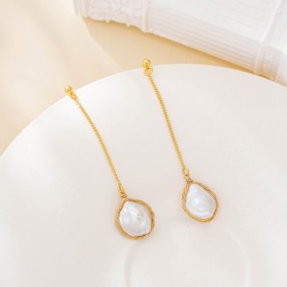Long baroque pearl chain drop earrings