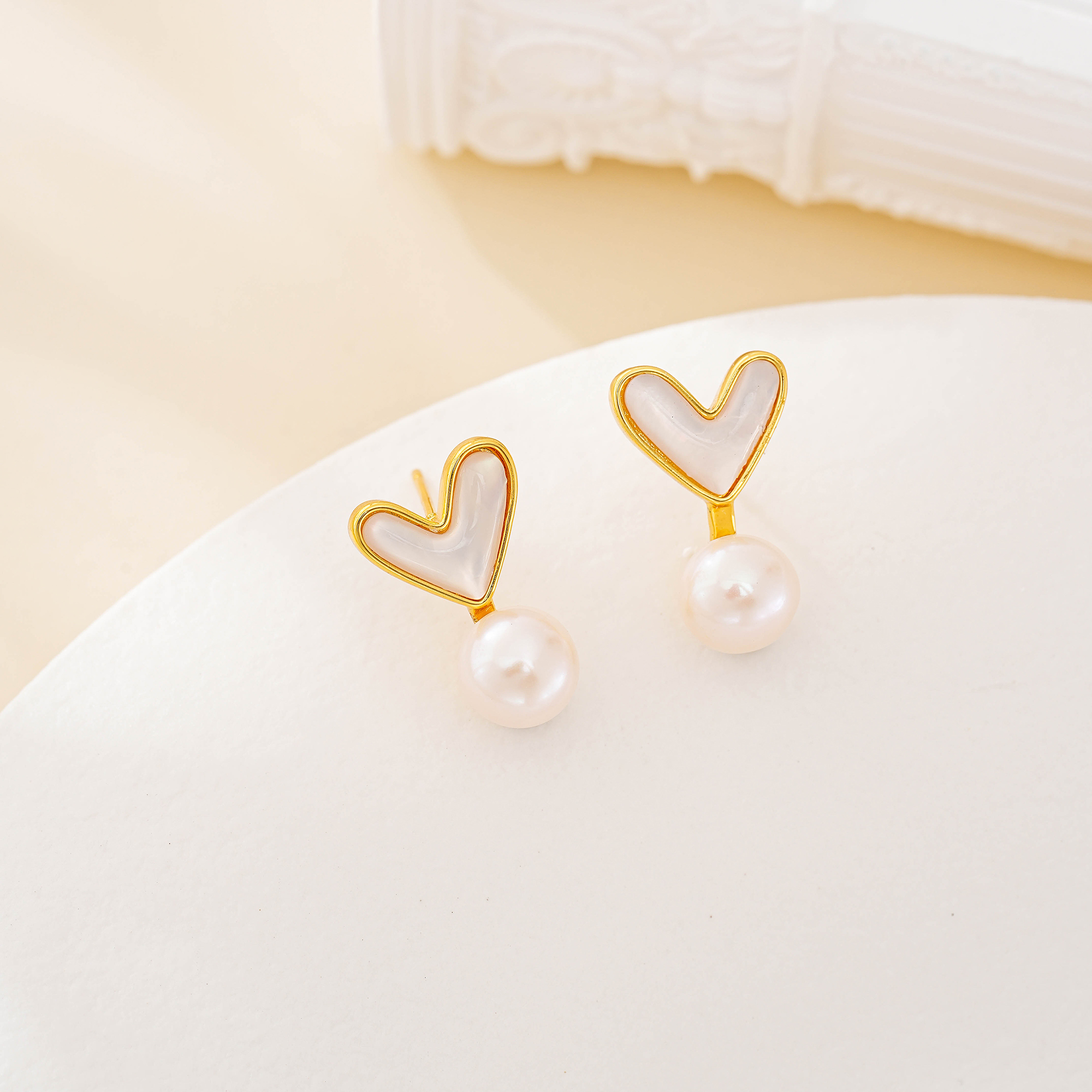 Open heart shell and pearl drop earrings