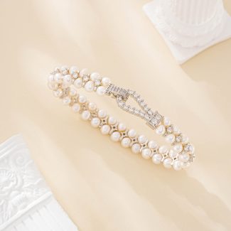 Silver-tone triple-strand pearl and zircon bracelet