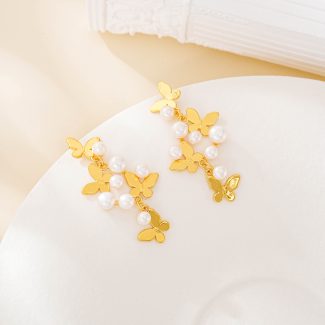 Butterfly cluster and pearl drop earrings