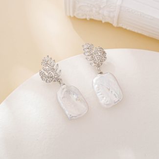Silver leaf earrings with square baroque pearls