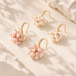 White and purple freshwater pearl cluster drop earrings with gold-plated copper hooks