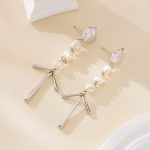 Silver-tone baroque pearl chandelier earrings with tapered drops