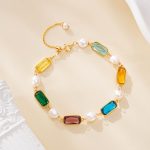 Multicolor gemstone bracelet with pearls and a gold-tone chain