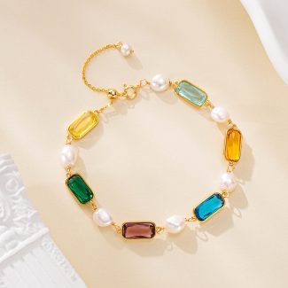 Multicolor gemstone bracelet with pearls and a gold-tone chain