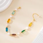 Gemstone and freshwater pearl bracelet shown open with its clasp