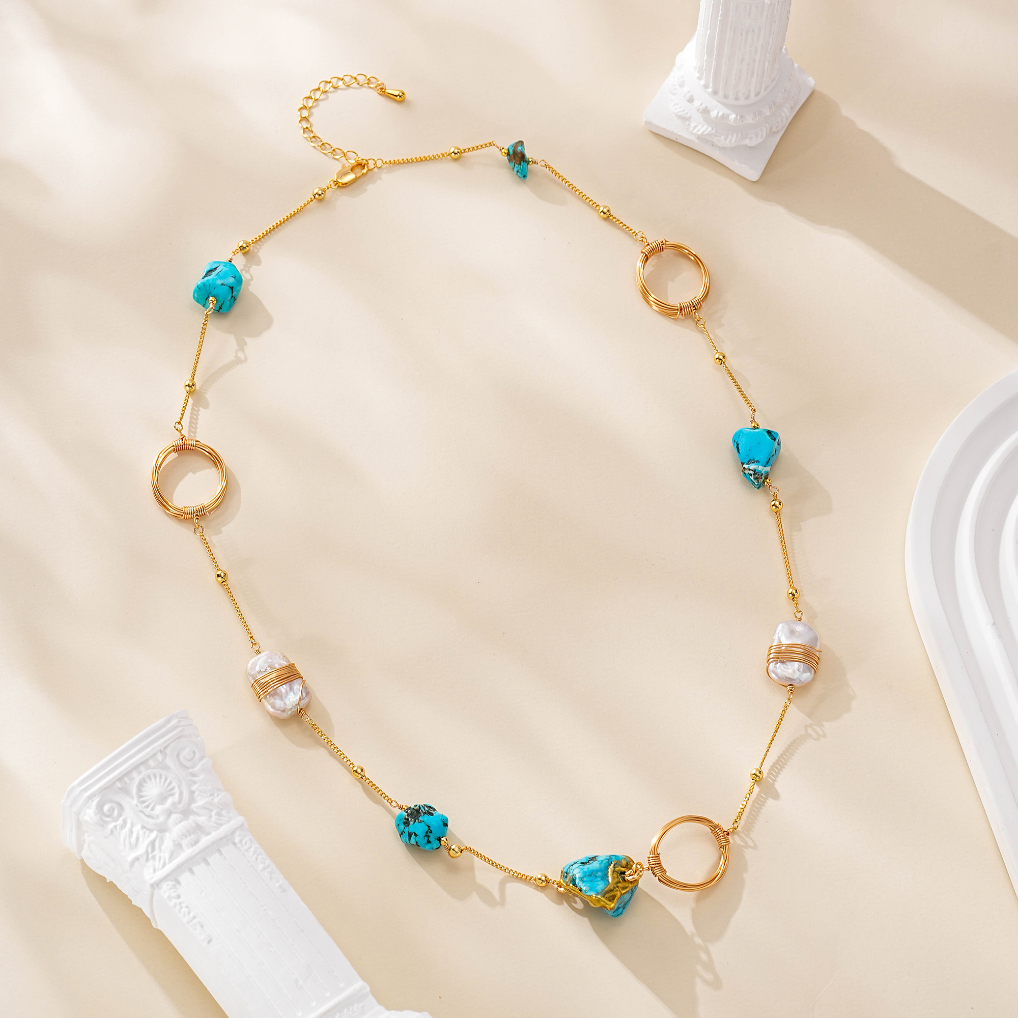 Full turquoise and baroque pearl necklace with an open spaced chain