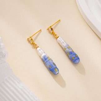 Painted pearl drop earrings with blue and gold details