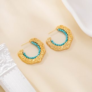 Textured gold-tone C-hoop earrings lined with turquoise beads