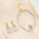 Ocean-painted baroque pearl earrings and blue bead bracelet set
