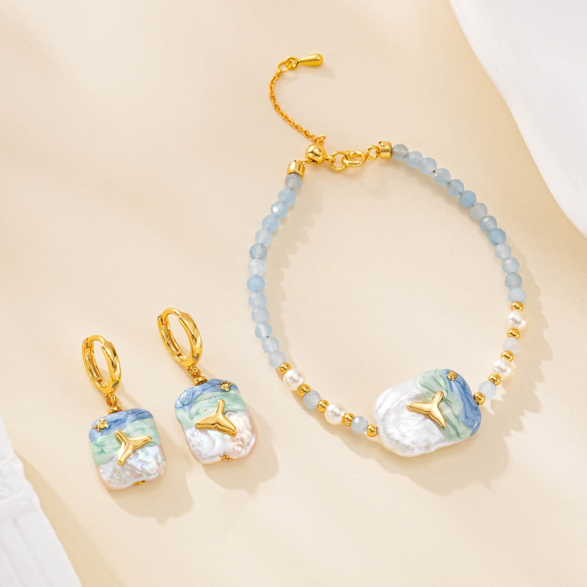 Ocean-painted baroque pearl earrings and blue bead bracelet set