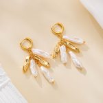 Baroque pearl earrings with sculptural gold-tone bar tassels