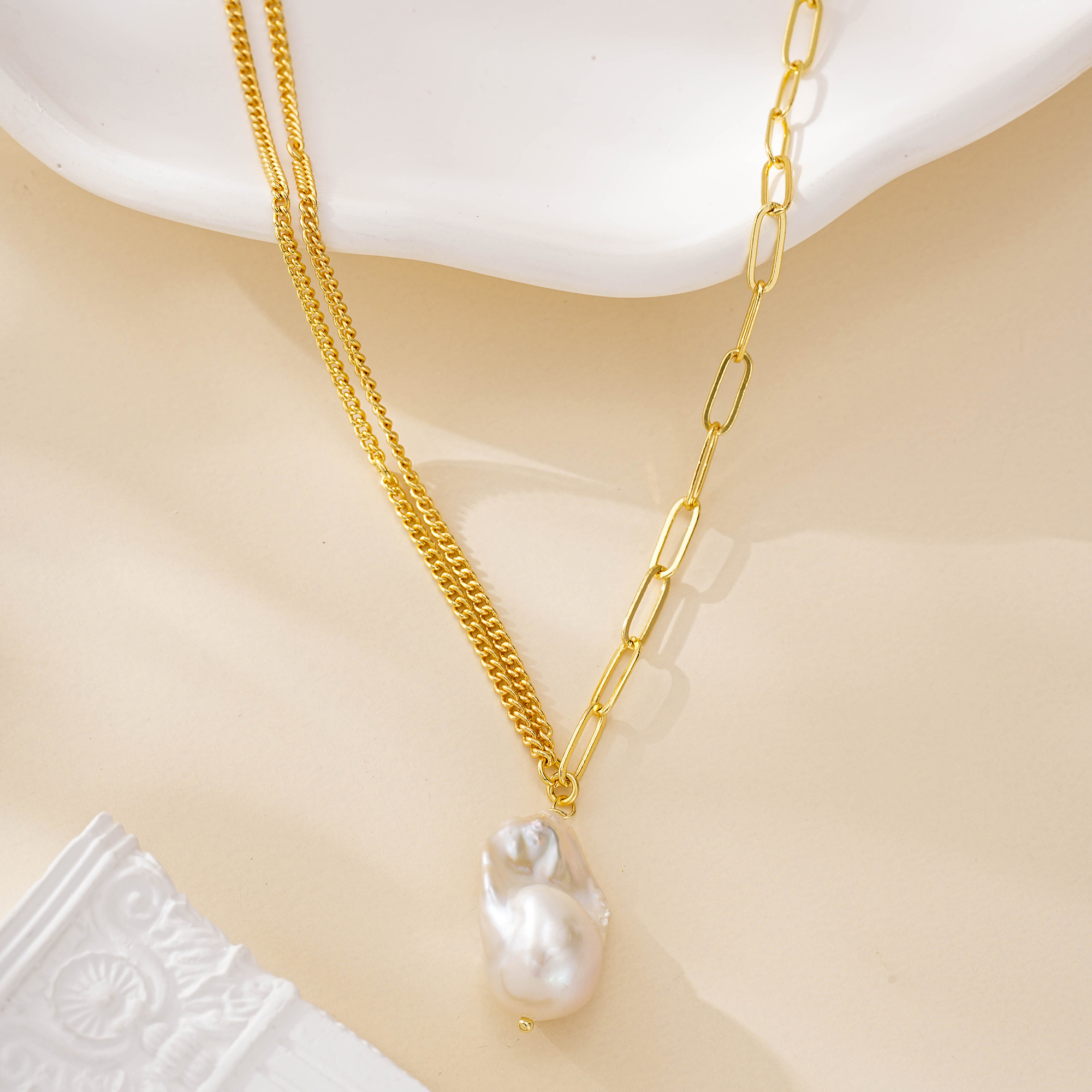 Full length view of asymmetric baroque pearl necklace