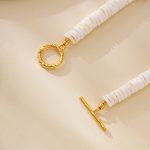 Shell disc bracelet showing its toggle clasp and organic shapes