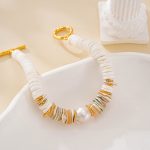 Detail of layered shell discs and freshwater pearl bracelet
