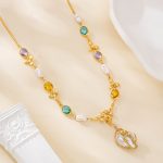 Multicolor gemstone and baroque pearl necklace with central pearl pendant