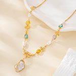 Close view of irregular gold-edged baroque pearl pendant