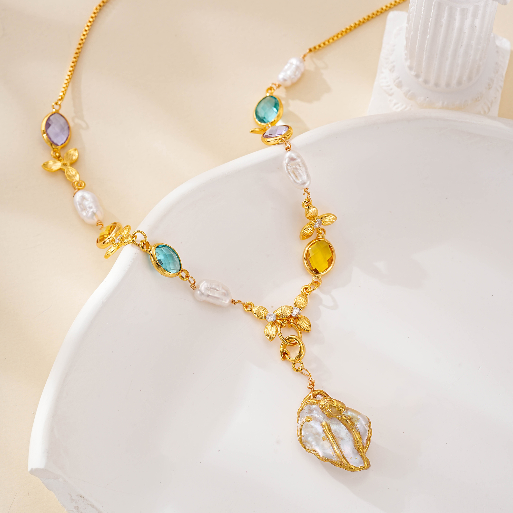 Full view of colorful gemstone and baroque pearl necklace