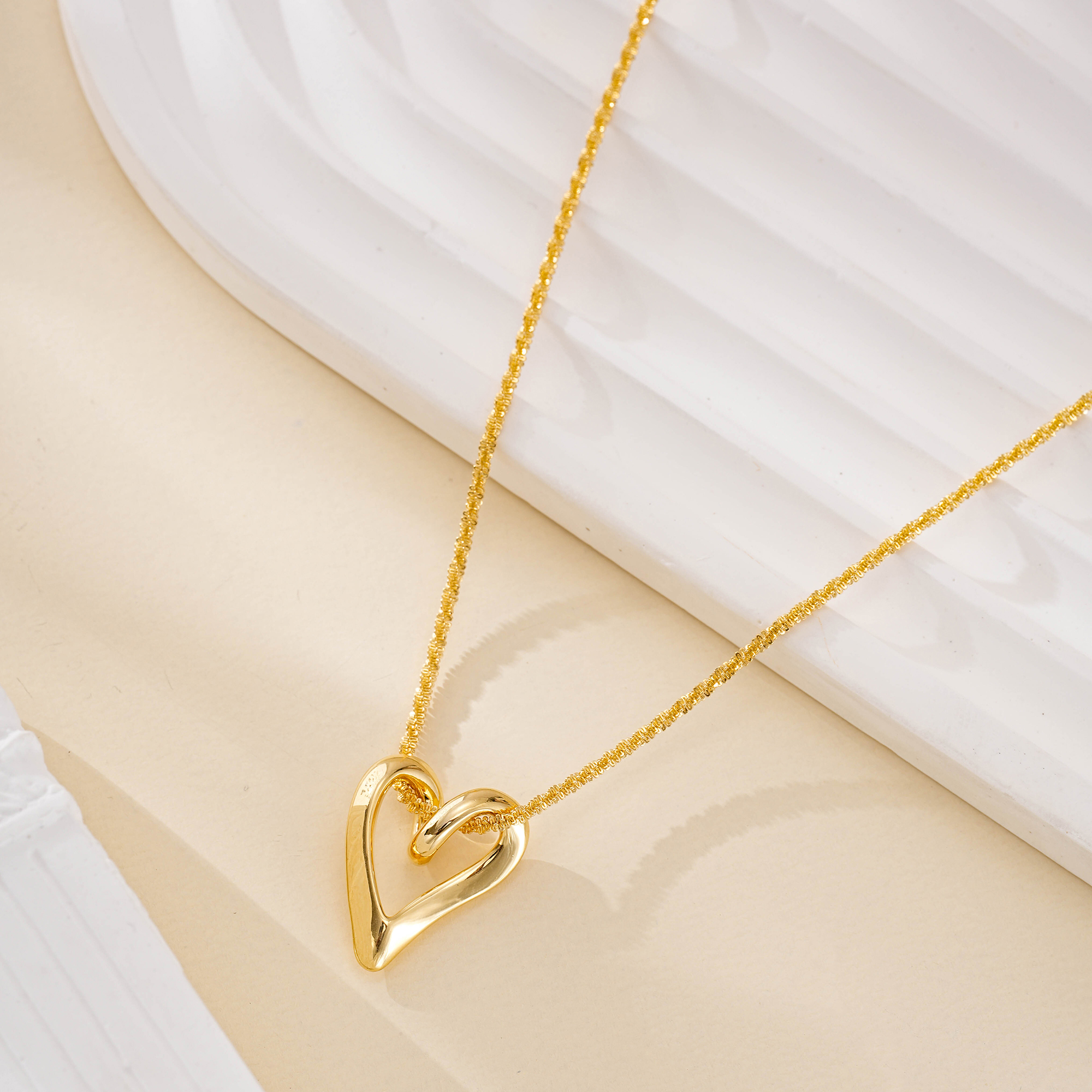 Heart pendant chain laid out to show its full length