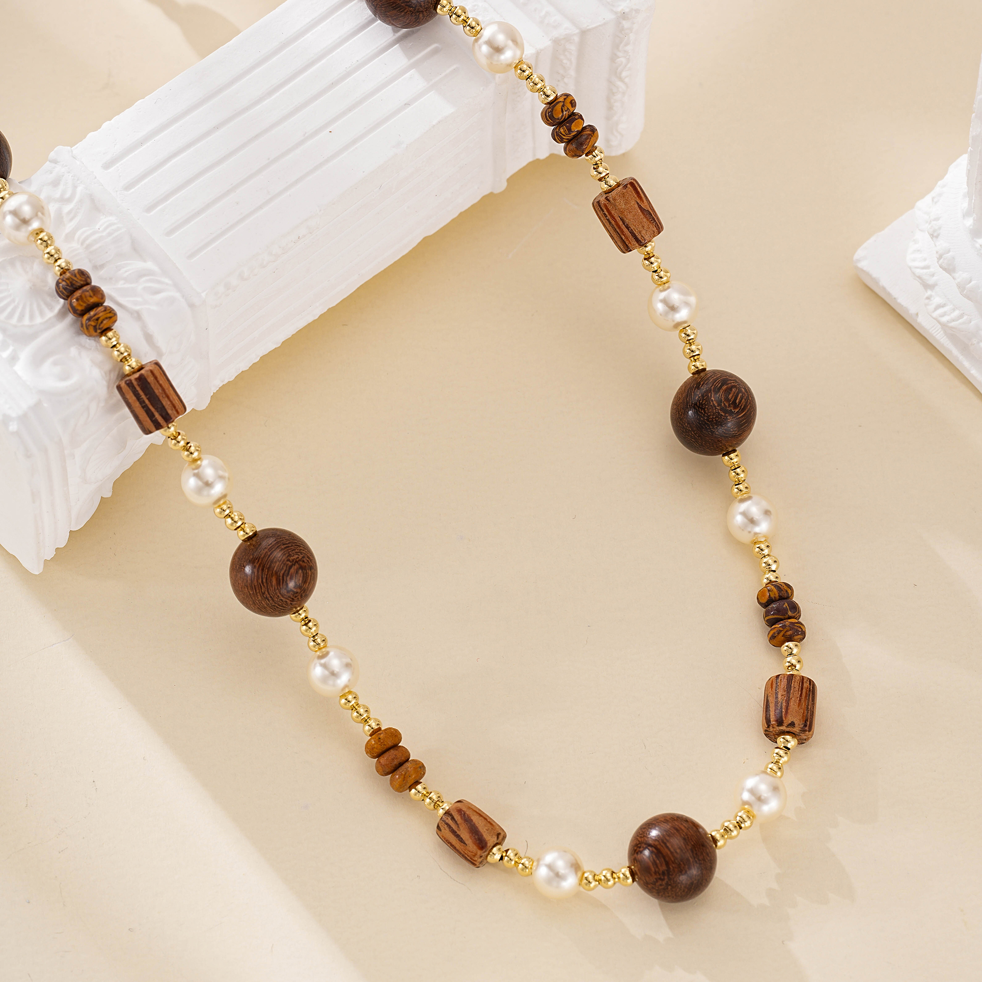 Wood-bead strand with small freshwater pearl accents