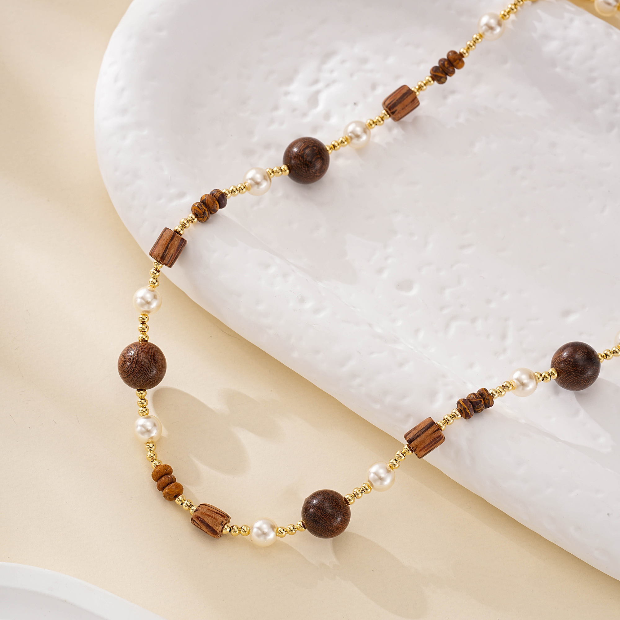 Full view of the wood-bead pearl strand necklace