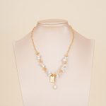Good Luck baroque pearl charm necklace displayed on a bust