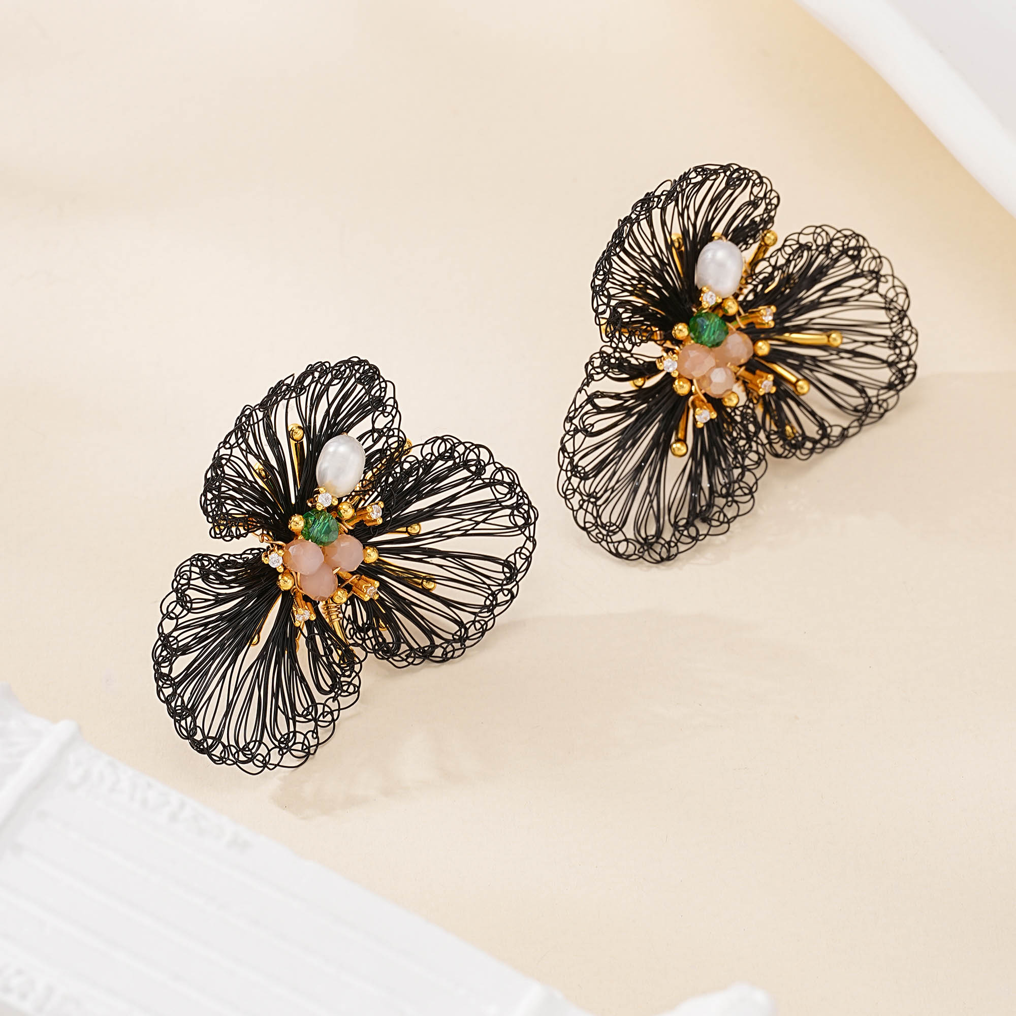 Wirework detail of Black Wire Flower Pearl Drop Earrings