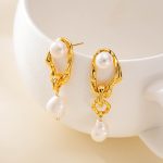 Angled view of gold-toned frames and dangling freshwater pearls