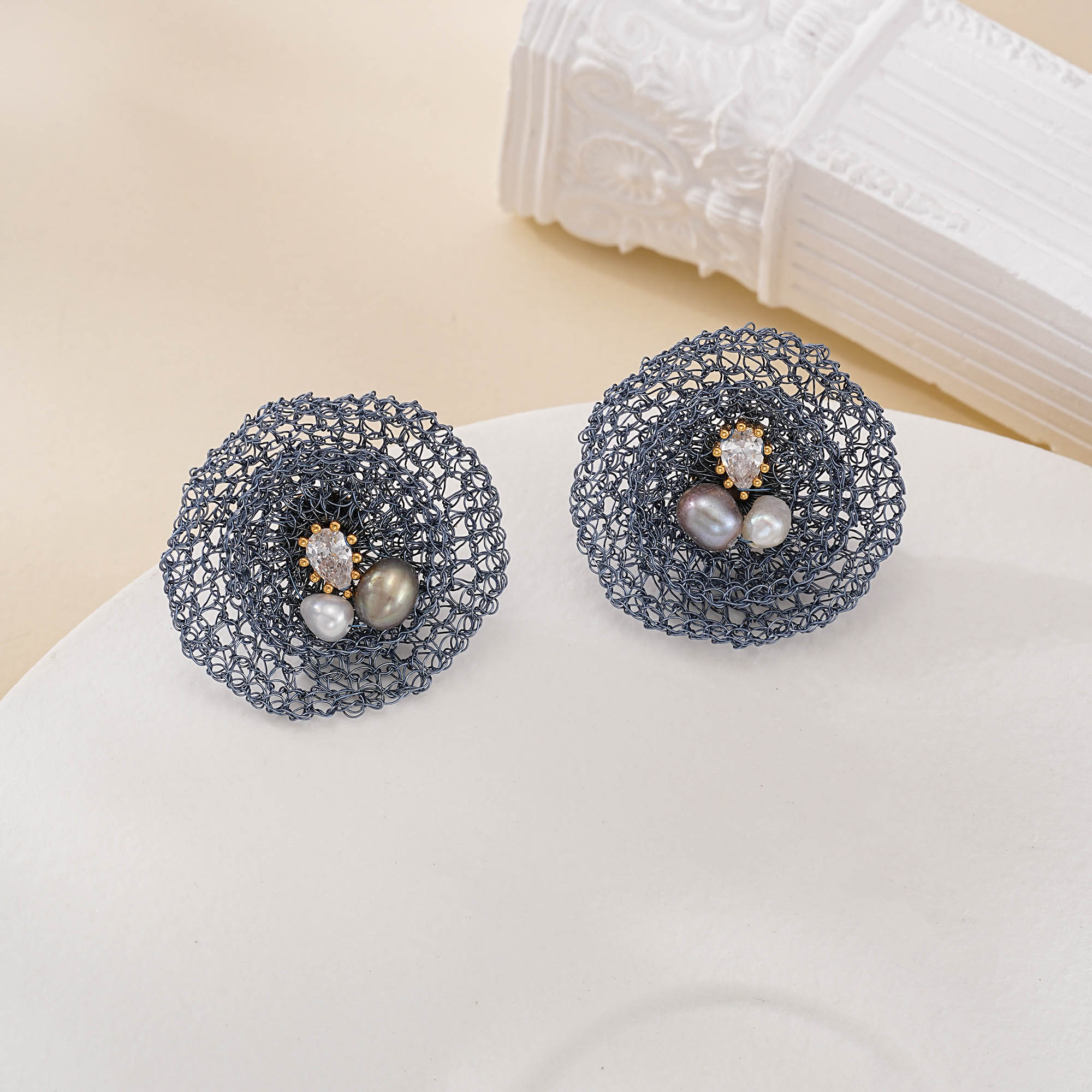 Wirework detail of Blue Wire Nest Pearl Drop Earrings