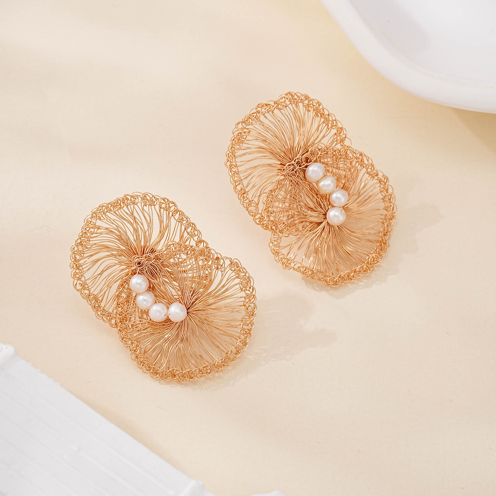 Wirework detail of Lotus Leaf Freshwater Pearl Earrings