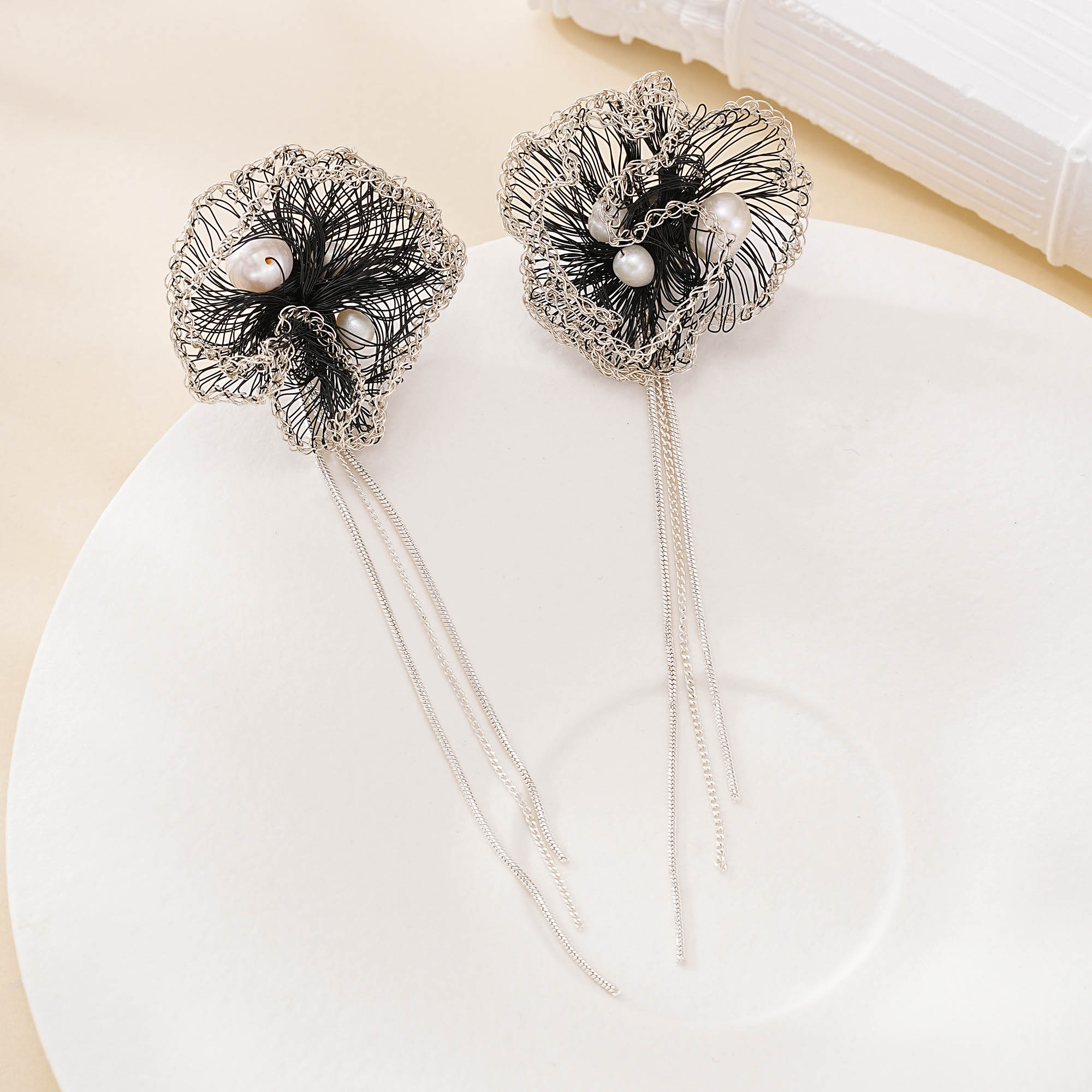 Wirework detail of Black Wire Pearl Tassel Earrings