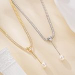 Gold and silver pearl drop snake chain necklace options shown together